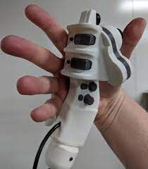 These are fun to imagine what the ideal "input object" for the human hand is. The PlayStation controller is pretty close to ideal for two handed input.